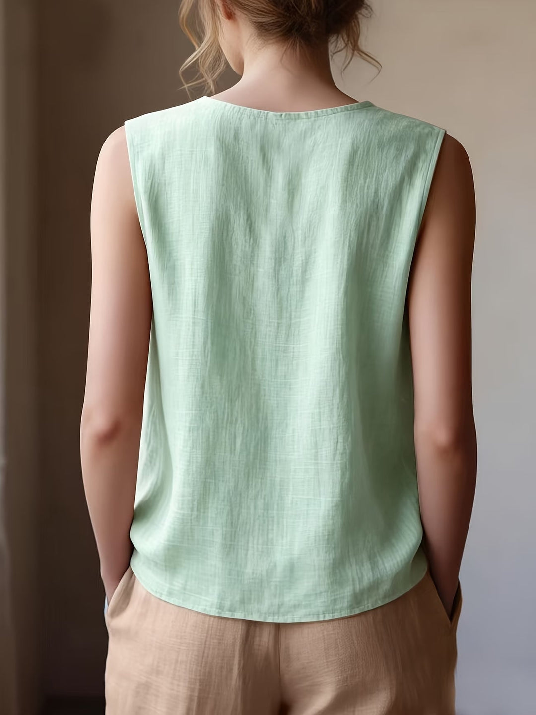 Safiya - Sleeveless Ruffle Neck Blouse