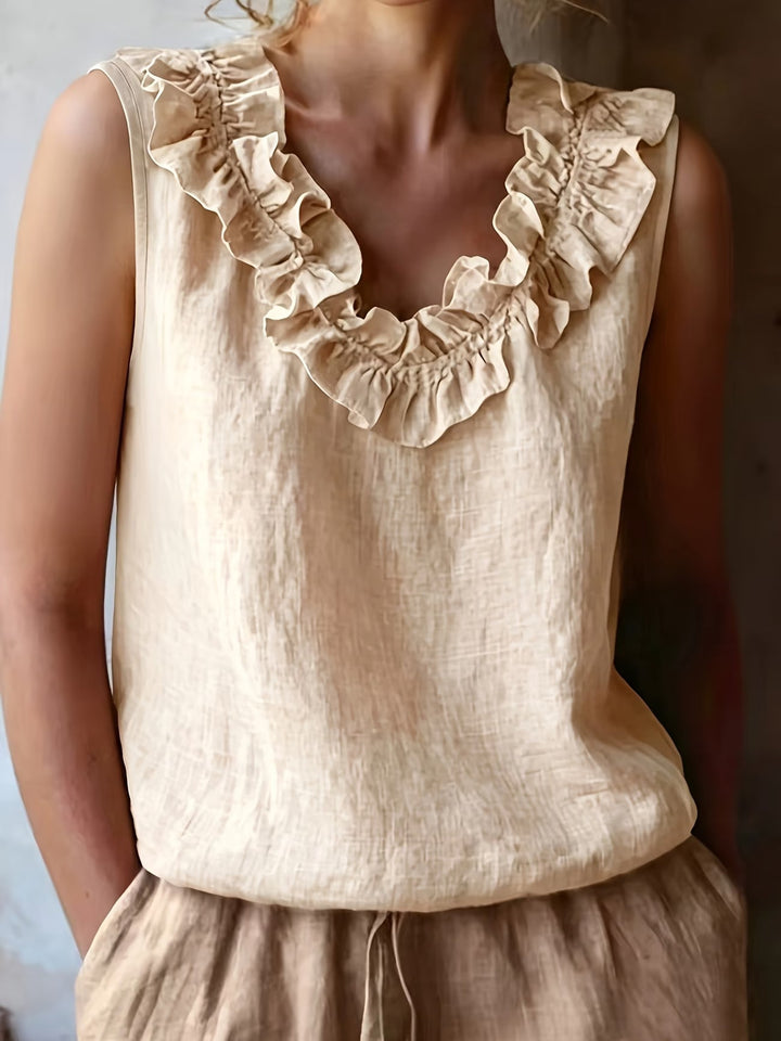 Safiya - Sleeveless Ruffle Neck Blouse